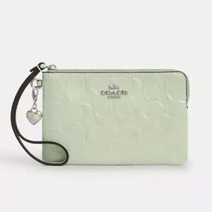 NWT coach! Corner Zip Wristlet In Signature Leather With Heart Charm